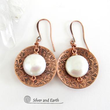 Artisan handcrafted copper earrings with a feminine, elegant style accented with white freshwater coin shaped pearls. Perfect for all occasions, they'll look great dressed up or down. Makes a great gift for couples celebrating their seventh wedding anniversary, as copper is the traditional choice for this occasion. 