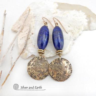 These handcrafted earrings feature beautiful long tube-shaped lapis lazuli gemstones accented with hammered gold brass dangles and tiny brass beads. The stones are a beautiful rich shade of blue with a sprinkling of natural sparkly pyrite inclusions. They have a modern, earthy chic elegance and can be worn with a variety of outfits - dressed up or down. Silver and Earth is a small business that makes beautiful handmade jewelry with high-quality natural materials. 