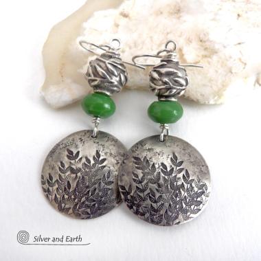 These artisan handcrafted sterling silver earrings have a beautifully detailed hand stamped leaf design. Green serpentine gemstones and pewter beads were added as an accent. The beads have a beautifully detailed 3-dimensional carved pattern of vines and leaves. They have a modern, earthy and elegant style that coordinates beautifully with all wardrobe types. They'll make a great gift for a nature lover - or a nice addition to your own jewelry wardrobe.
