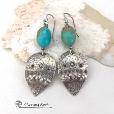 These handcrafted earrings feature natural turquoise nuggets accented with sterling silver dangles with a hammered and hand stamped texture. The stones are a gorgeous shade of turquoise with a natural copper matrix. They have an earthy organic, modern style with southwestern flair. The earrings are handmade and are a beautiful example of southwest style jewelry. Handmade by Silver and Earth, a New Mexico True Certified business.
